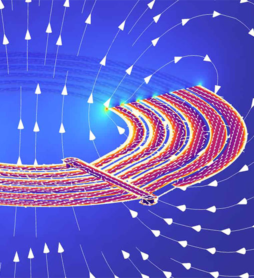Shows the magnetic field lines and currents in an electromagnetic simulation of the transmitter coil